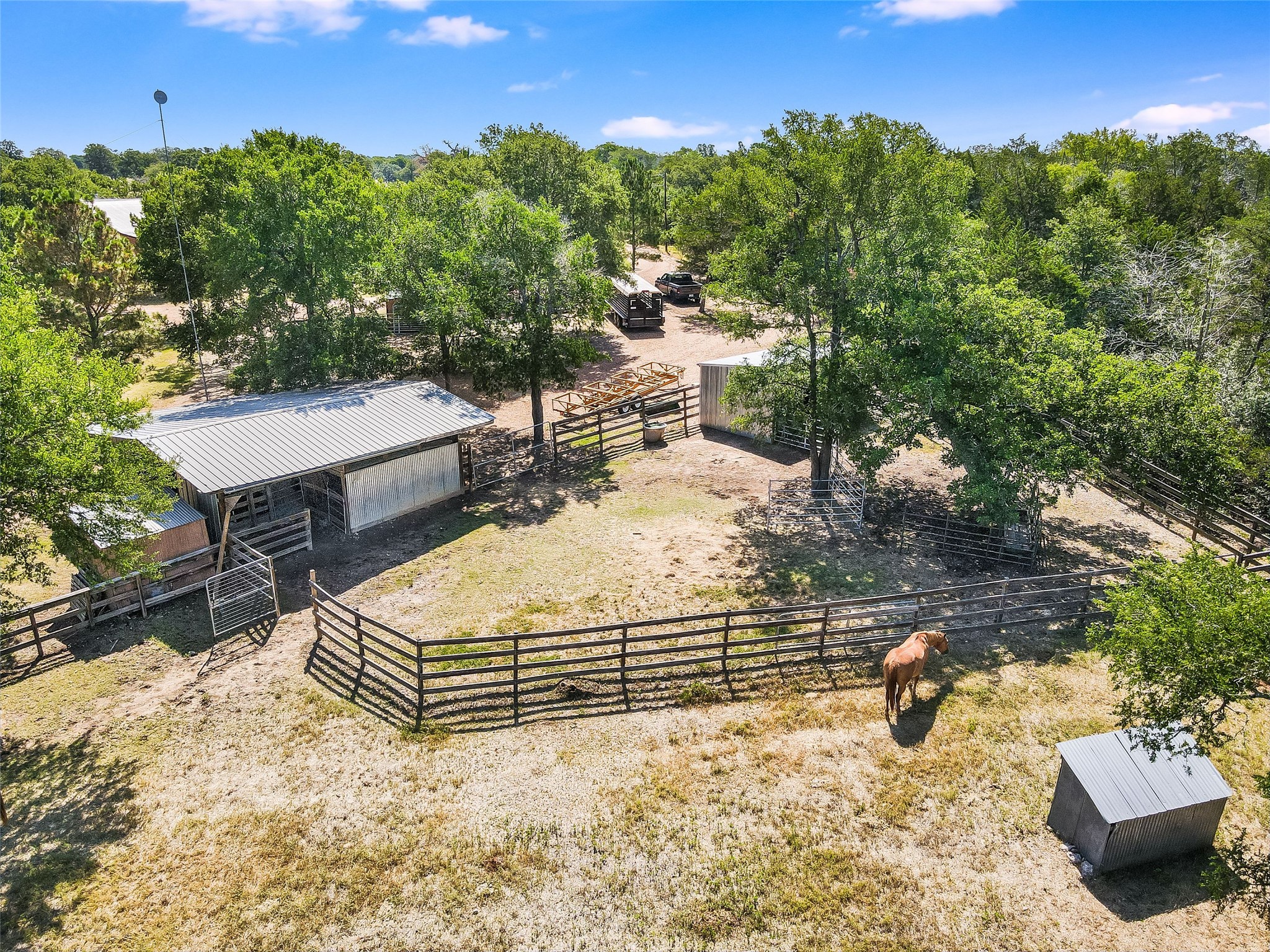 762 Karisch Road Smithville, TX 78957 - Photo 27 of 40 a view of a backyard with sitting area