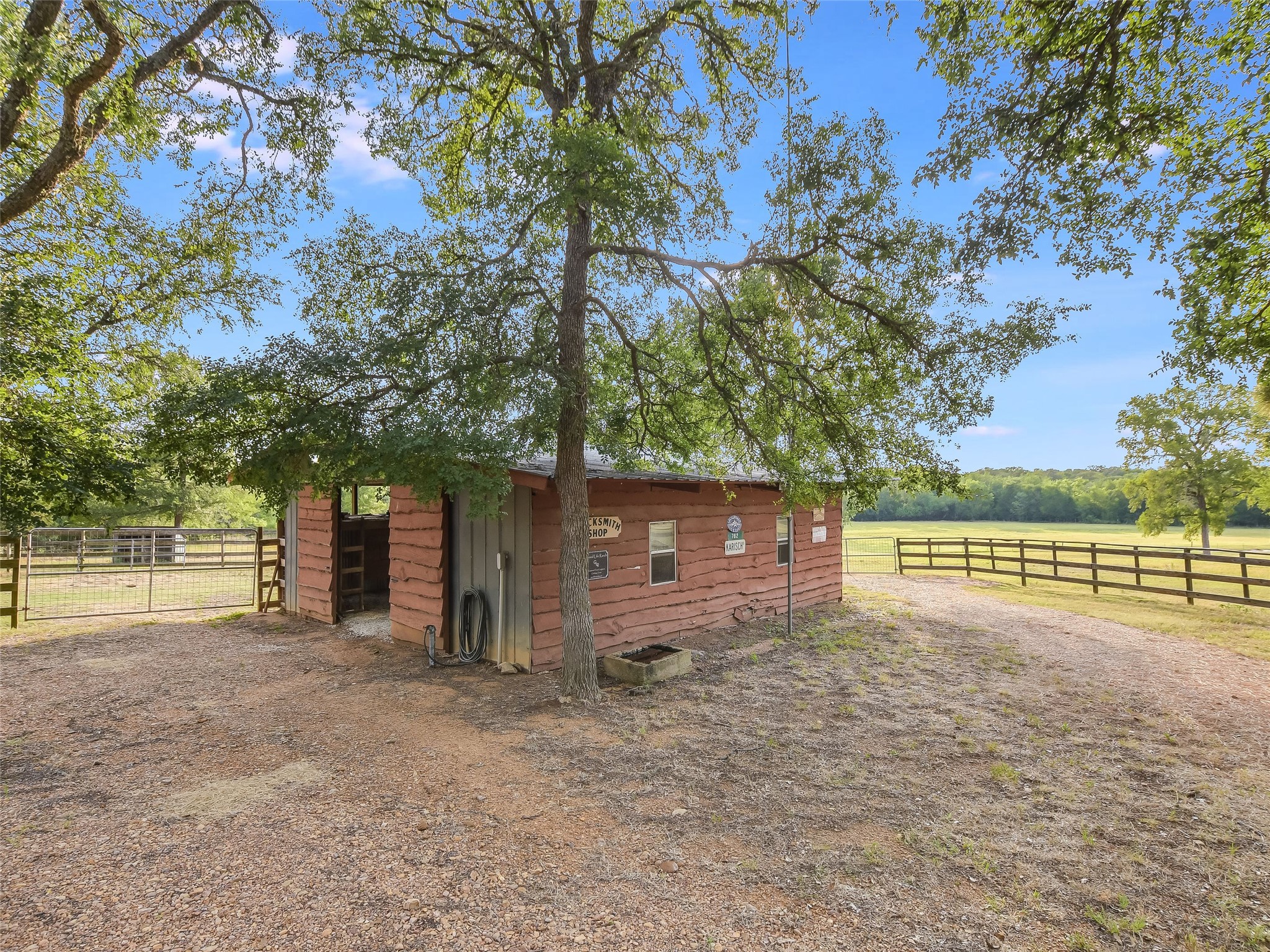 762 Karisch Road Smithville, TX 78957 - Photo 28 of 40 a view of a house with a yard and tree s