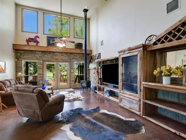 a bed room with bed and window