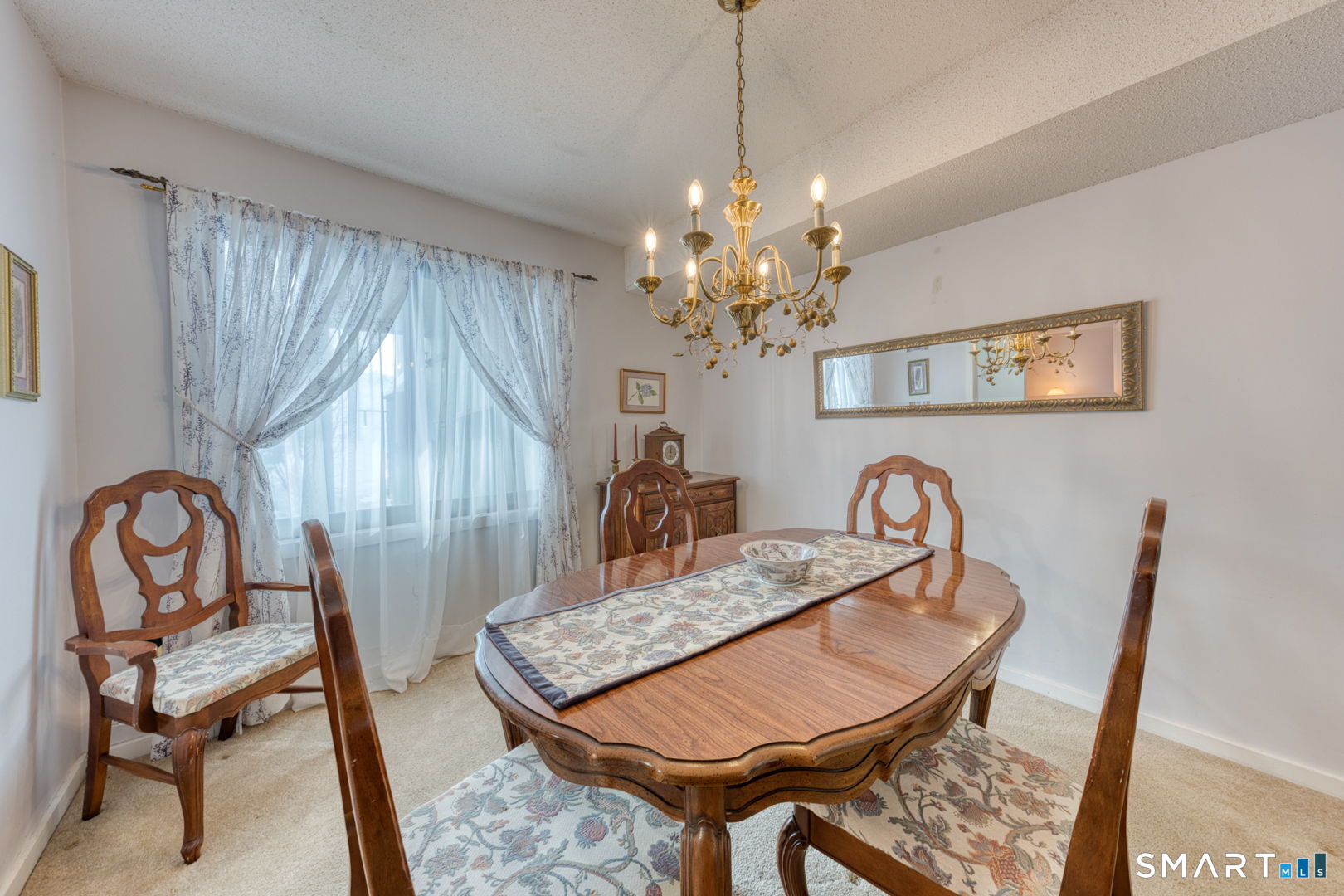 40 Hickory Hill Road, Unit 40 Southington, CT 06489 - Photo 17 of 35 a view of a dining room with furniture window and wooden floor
