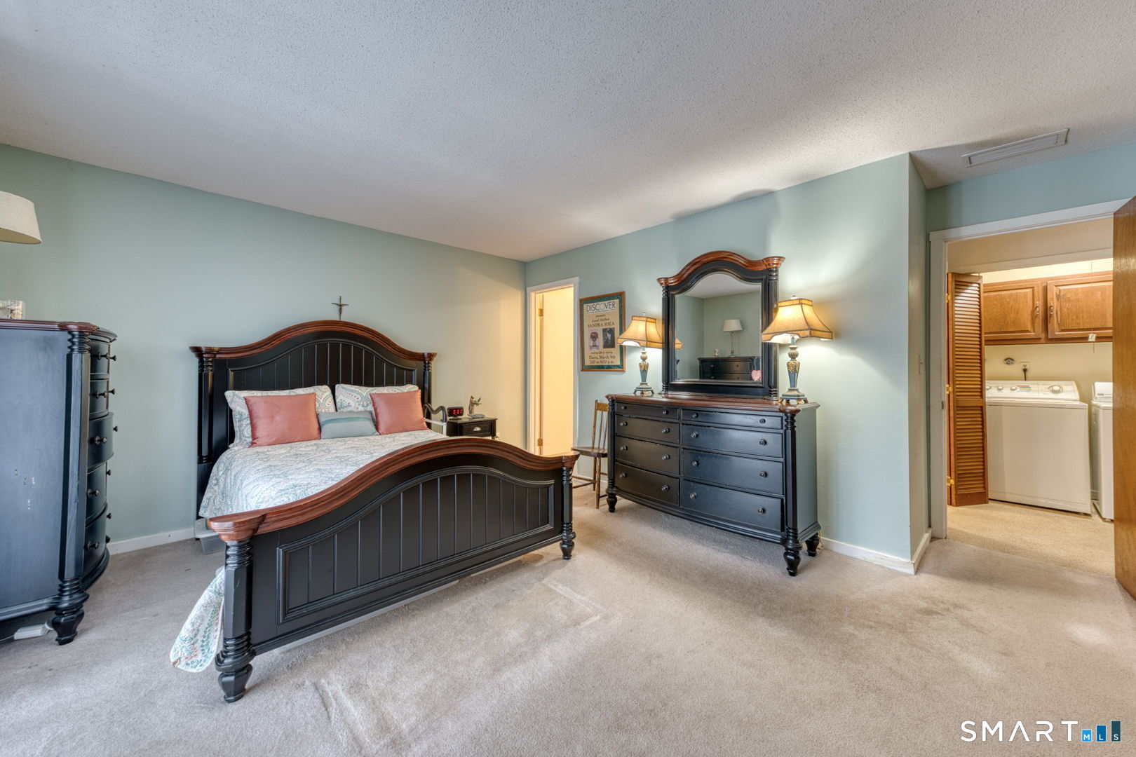 40 Hickory Hill Road, Unit 40 Southington, CT 06489 - Photo 20 of 35 a bedroom with a bed and a dresser