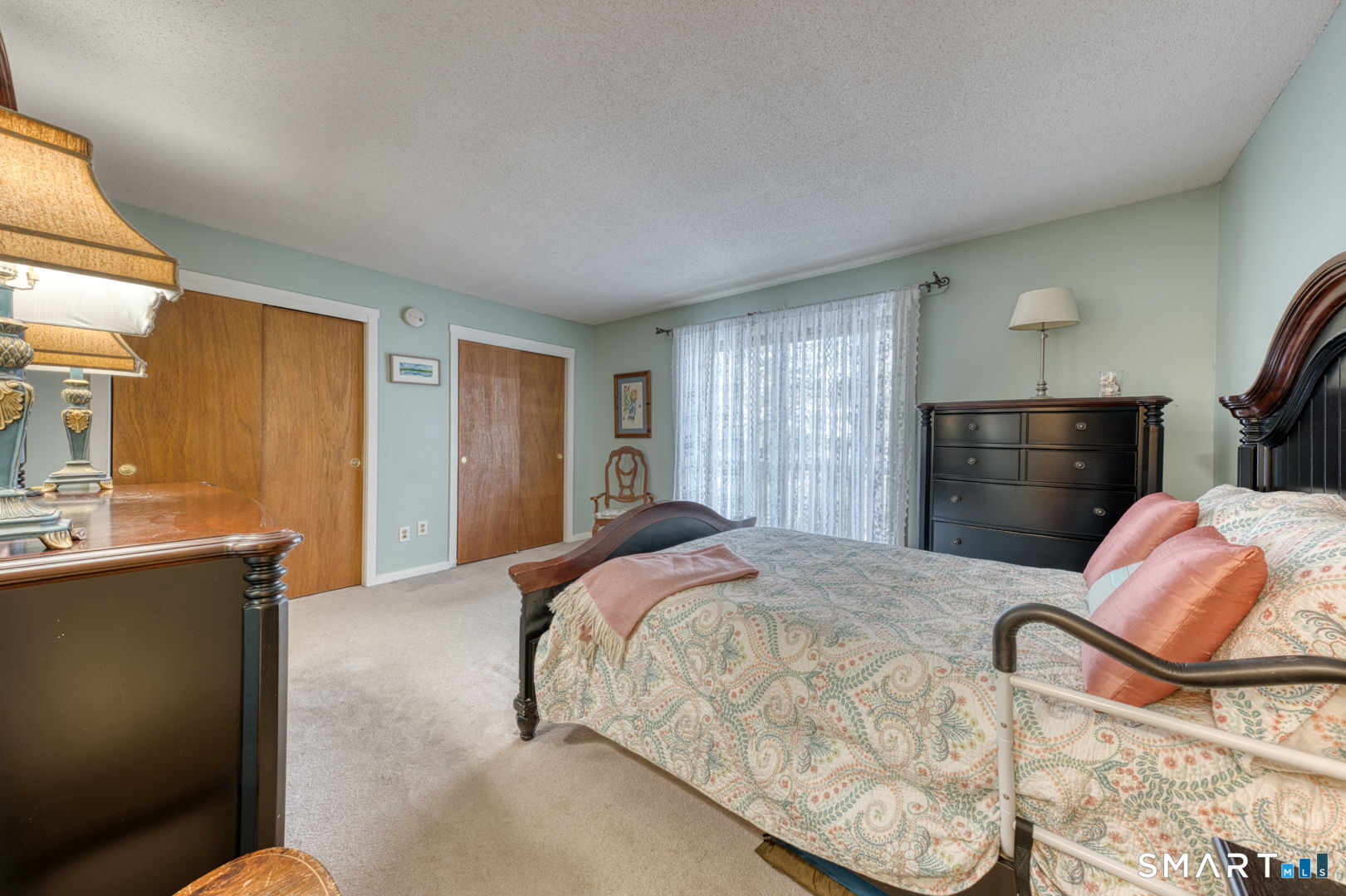 40 Hickory Hill Road, Unit 40 Southington, CT 06489 - Photo 21 of 35 a bedroom with a bed and a dresser