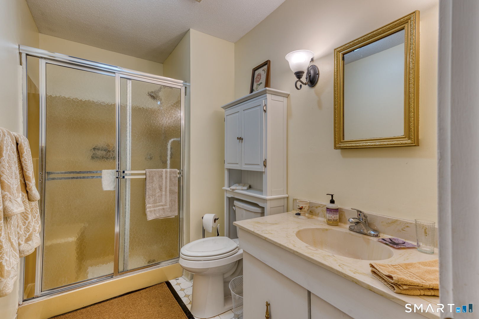 40 Hickory Hill Road, Unit 40 Southington, CT 06489 - Photo 22 of 35 a bathroom with a sink toilet and shower