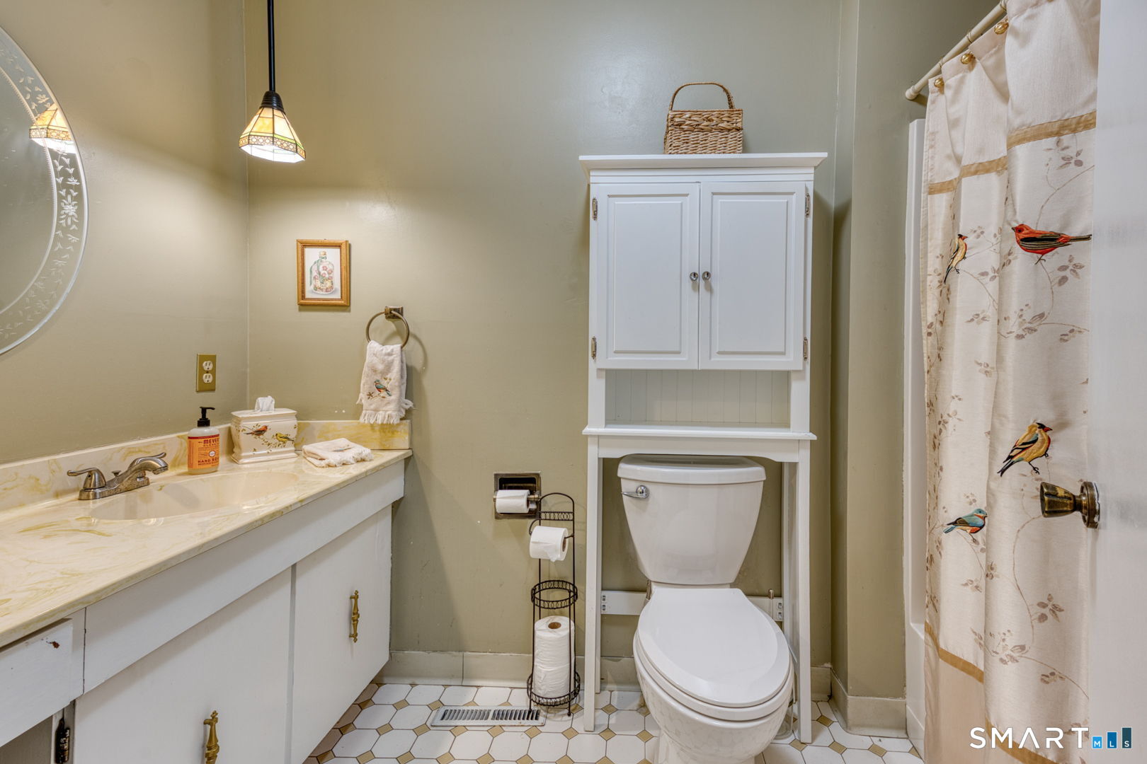 40 Hickory Hill Road, Unit 40 Southington, CT 06489 - Photo 24 of 35 a bathroom with a toilet a sink and mirror