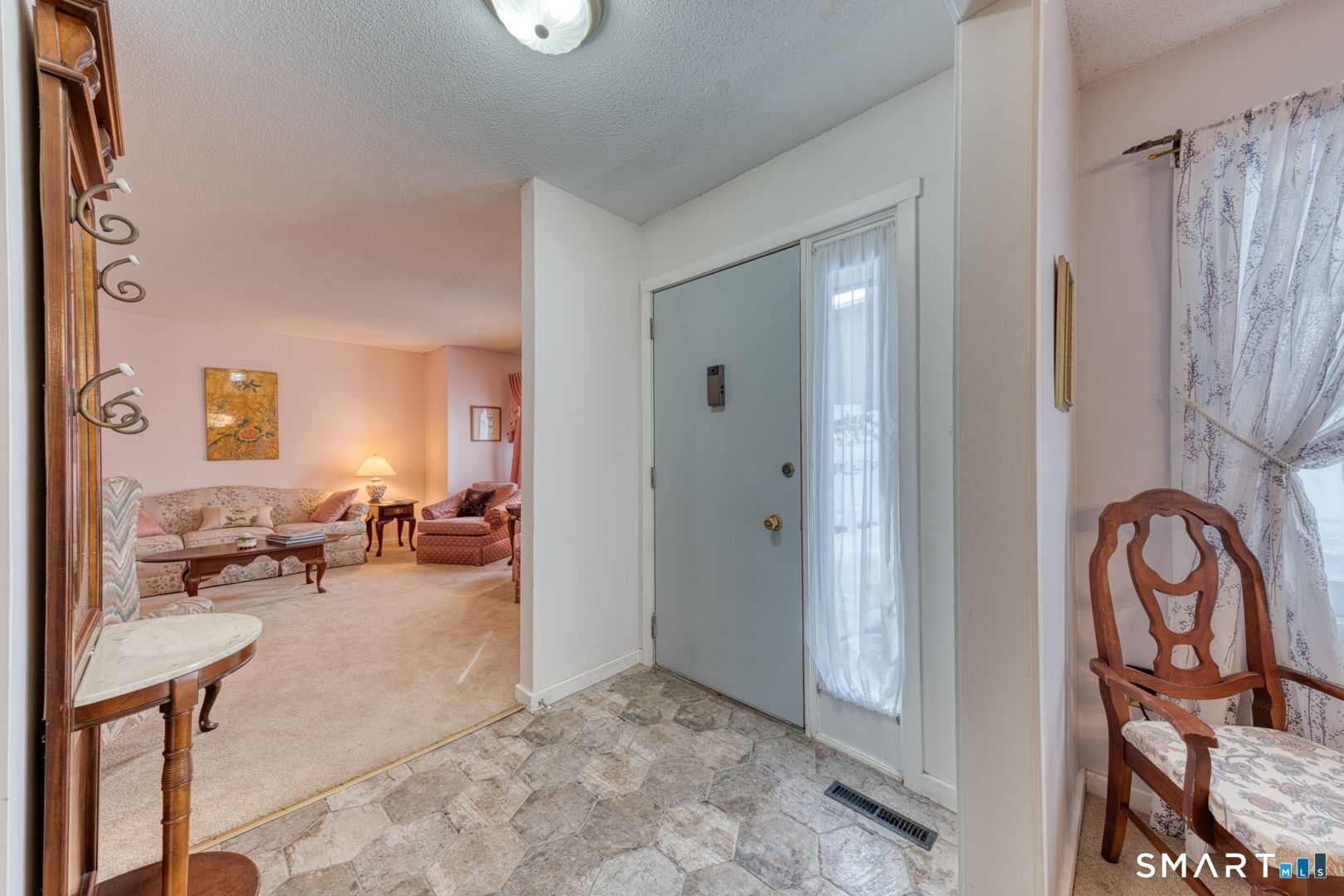 40 Hickory Hill Road, Unit 40 Southington, CT 06489 - Photo 3 of 35 a view of living room filled with furniture and window