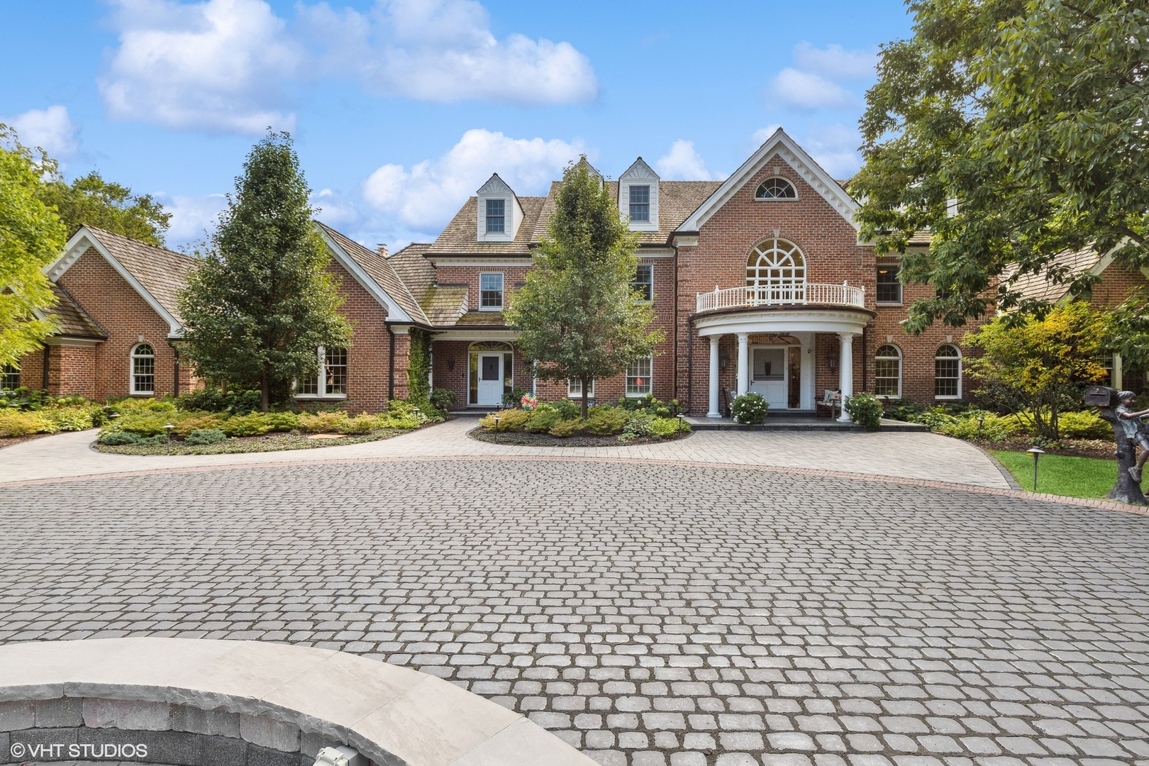 475 West Deerpath Road Lake Forest, IL 60045 - Photo 1 of 35 a front view of a house with a yard