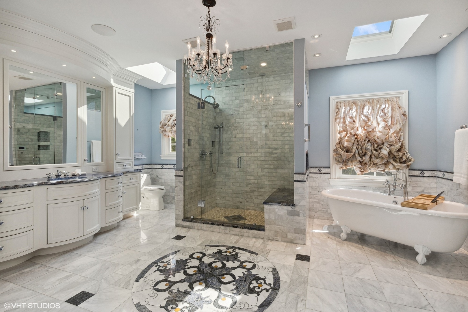 475 West Deerpath Road Lake Forest, IL 60045 - Photo 17 of 35 a spacious bathroom with a bathtub a sink and a shower