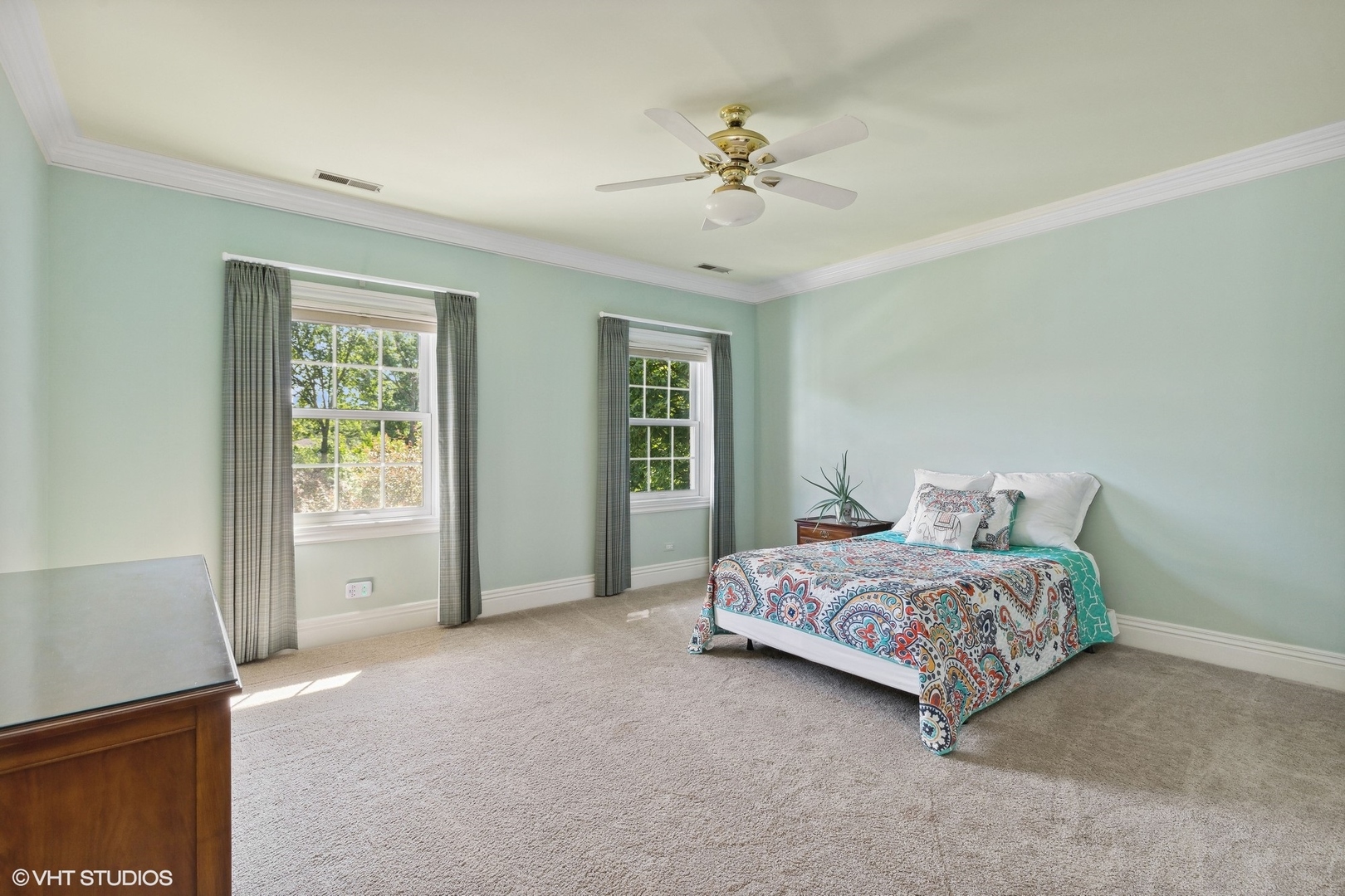 475 West Deerpath Road Lake Forest, IL 60045 - Photo 18 of 35 a bedroom with a bed and a chandelier