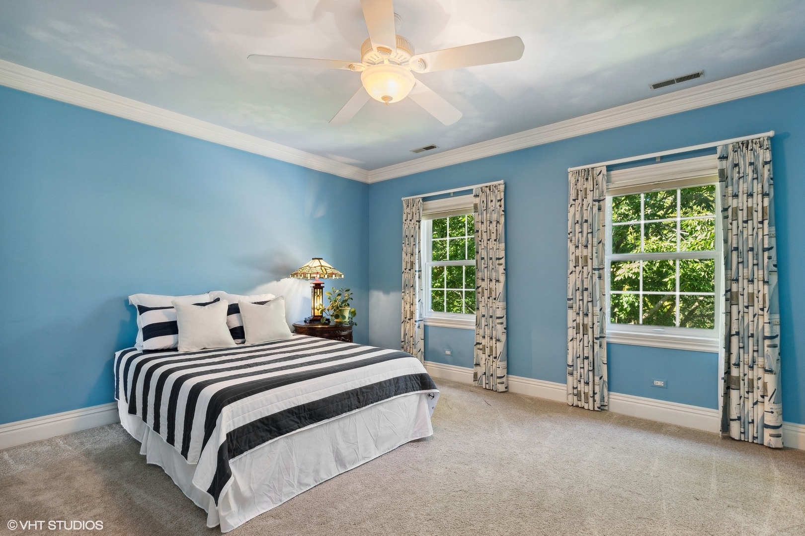 475 West Deerpath Road Lake Forest, IL 60045 - Photo 20 of 35 a bedroom with a bed and a chandelier