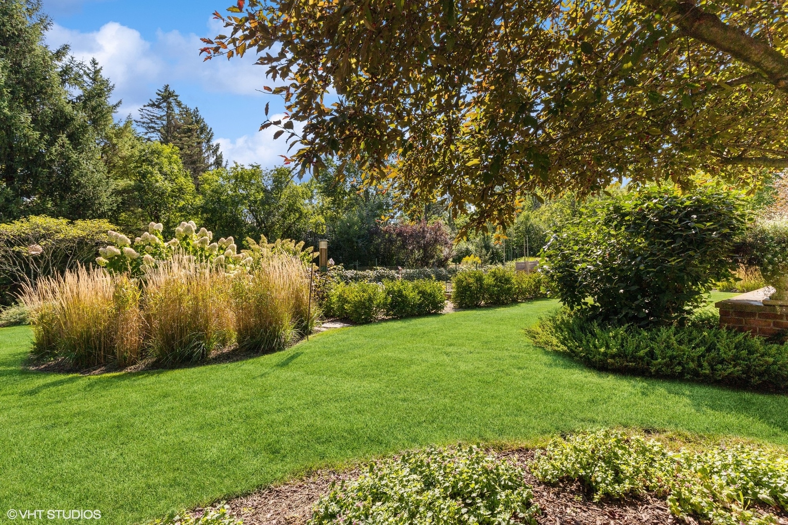 475 West Deerpath Road Lake Forest, IL 60045 - Photo 26 of 35 a view of a yard with a tree
