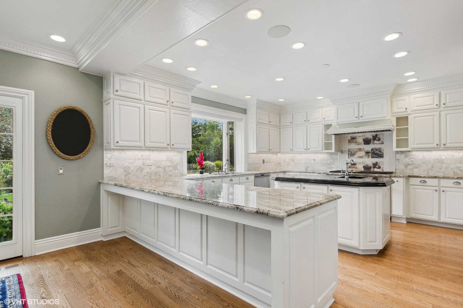 475 West Deerpath Road Lake Forest, IL 60045 - Photo 8 of 35 a kitchen with counter top space cabinets and stainless steel appliances