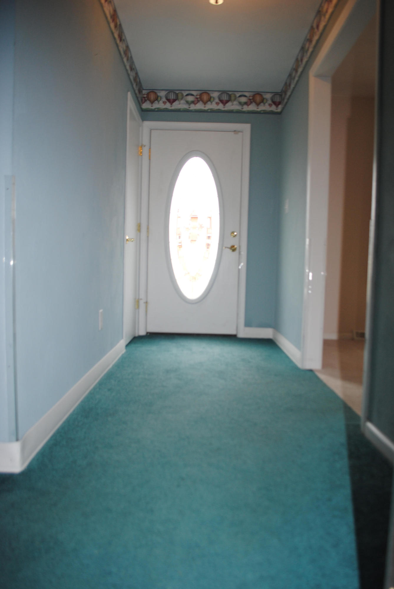 238 Mountain Pass Road Blue Ridge, VA 24064 - Photo 14 of 18 a view of a livingroom with wooden floor and a white wall
