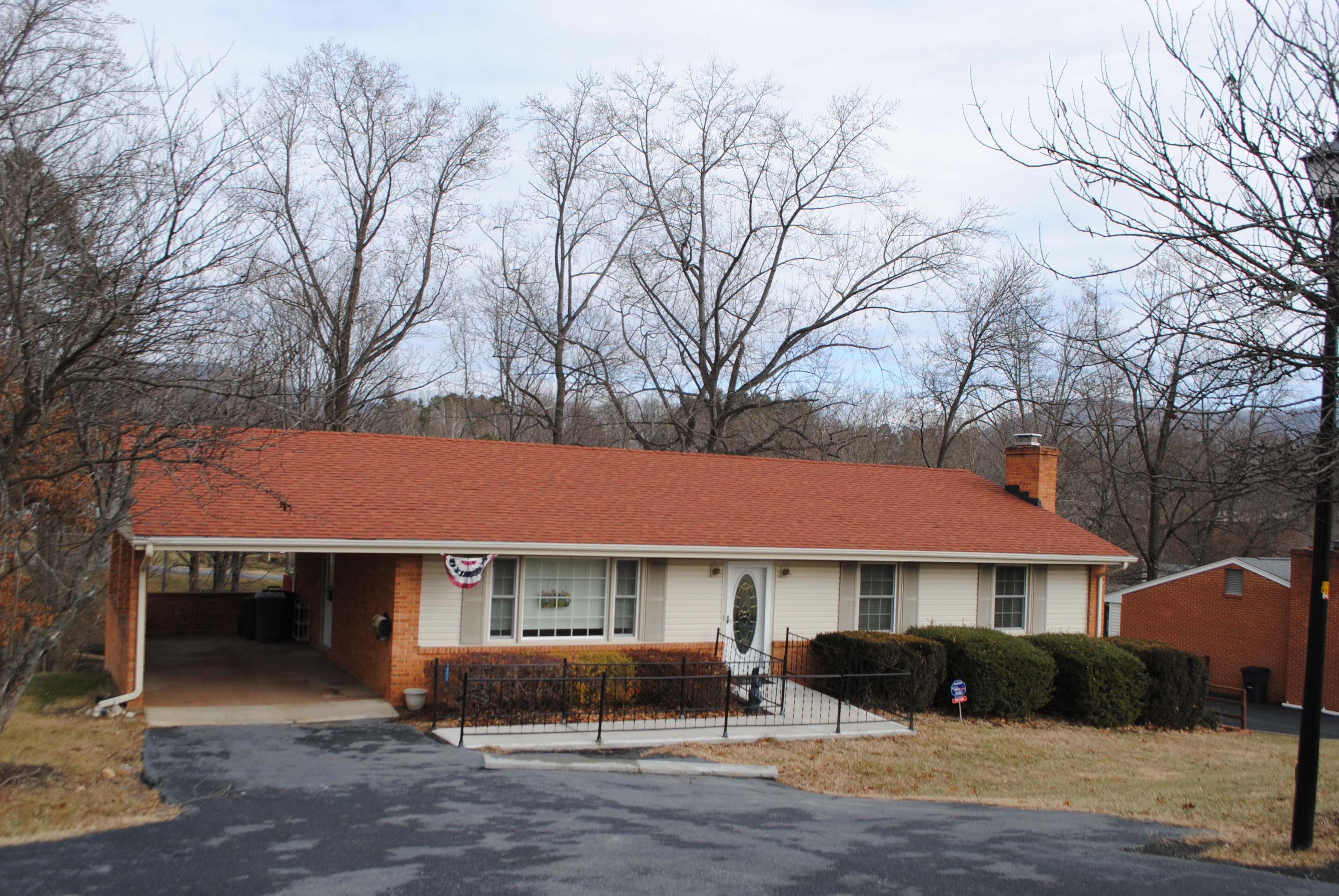 238 Mountain Pass Road Blue Ridge, VA 24064 - Photo 6 of 18 a front view of a house with garden