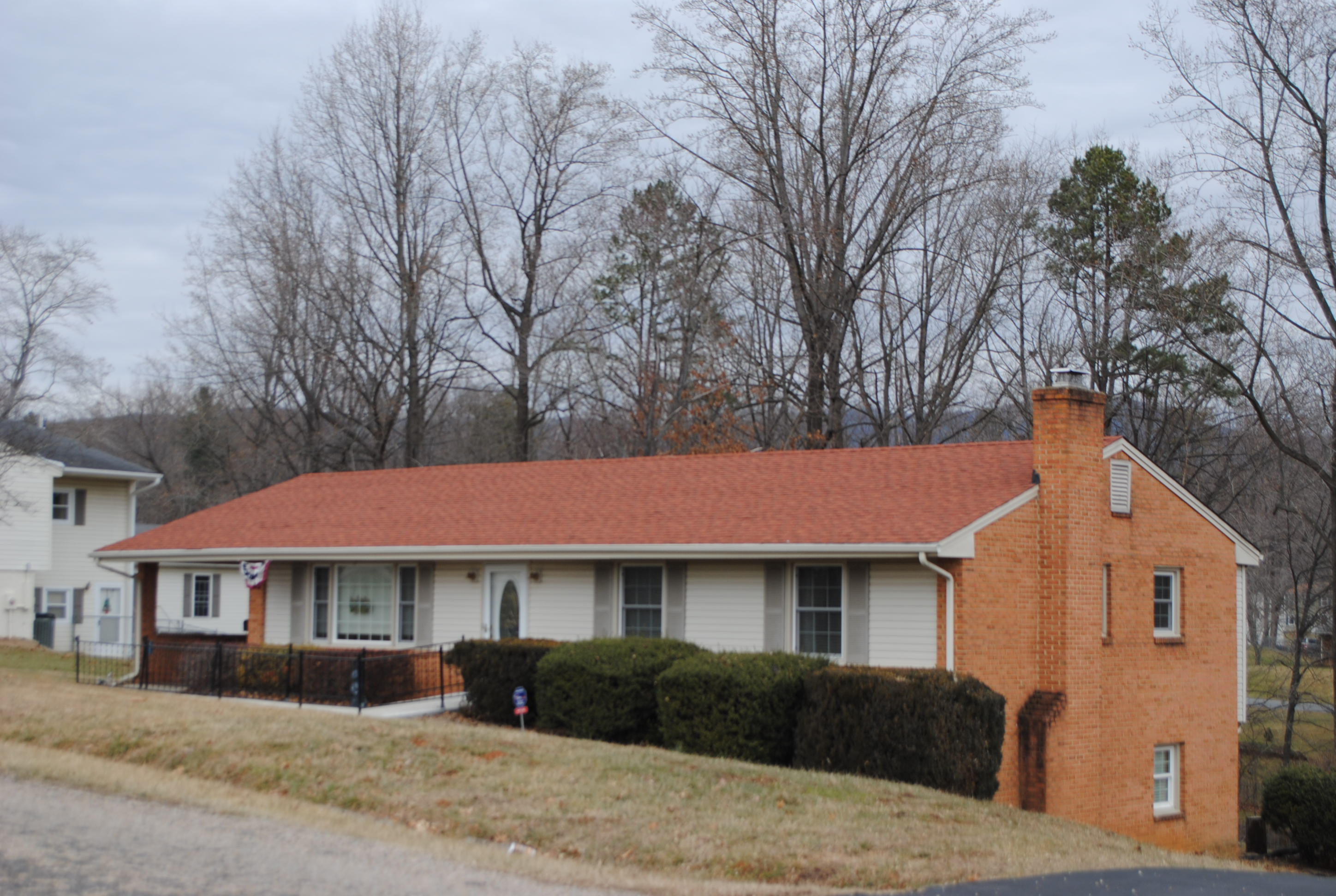 238 Mountain Pass Road Blue Ridge, VA 24064 - Photo 7 of 18 a front view of a house with a yard