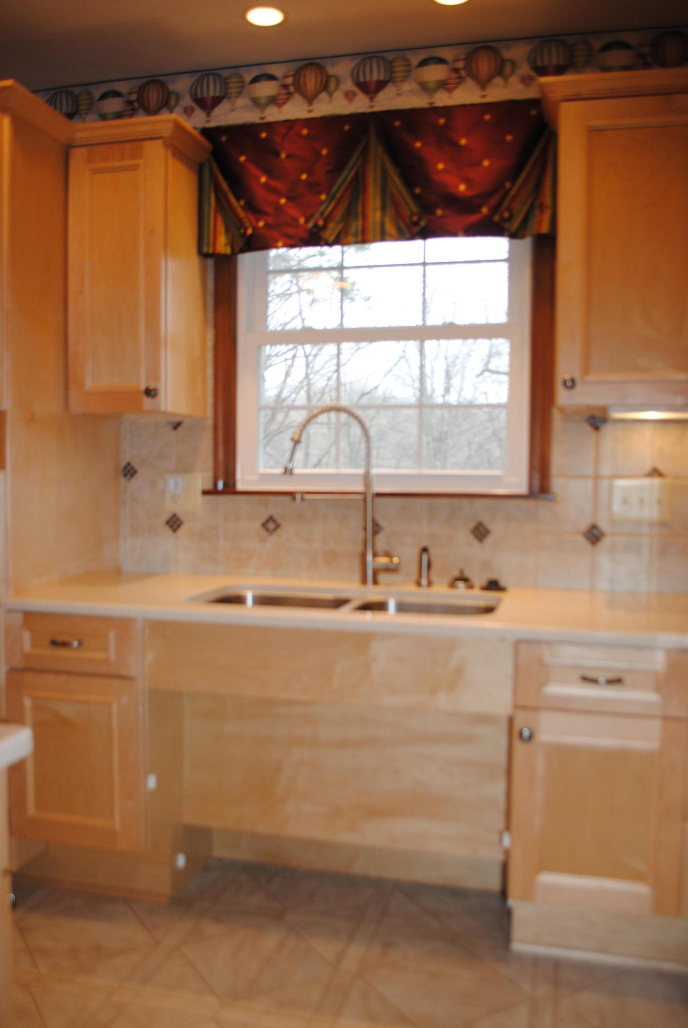 238 Mountain Pass Road Blue Ridge, VA 24064 - Photo 9 of 18 a view of a kitchen with a sink and a window