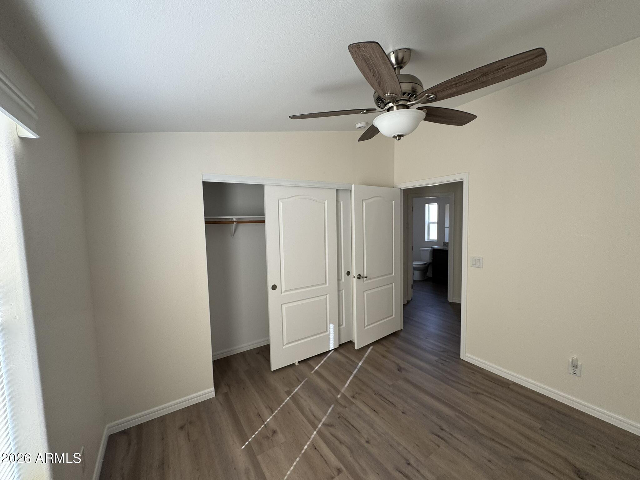 4123 Cowlic Road Golden Valley, AZ 86413 - Photo 11 of 15 a view of an empty room with a window