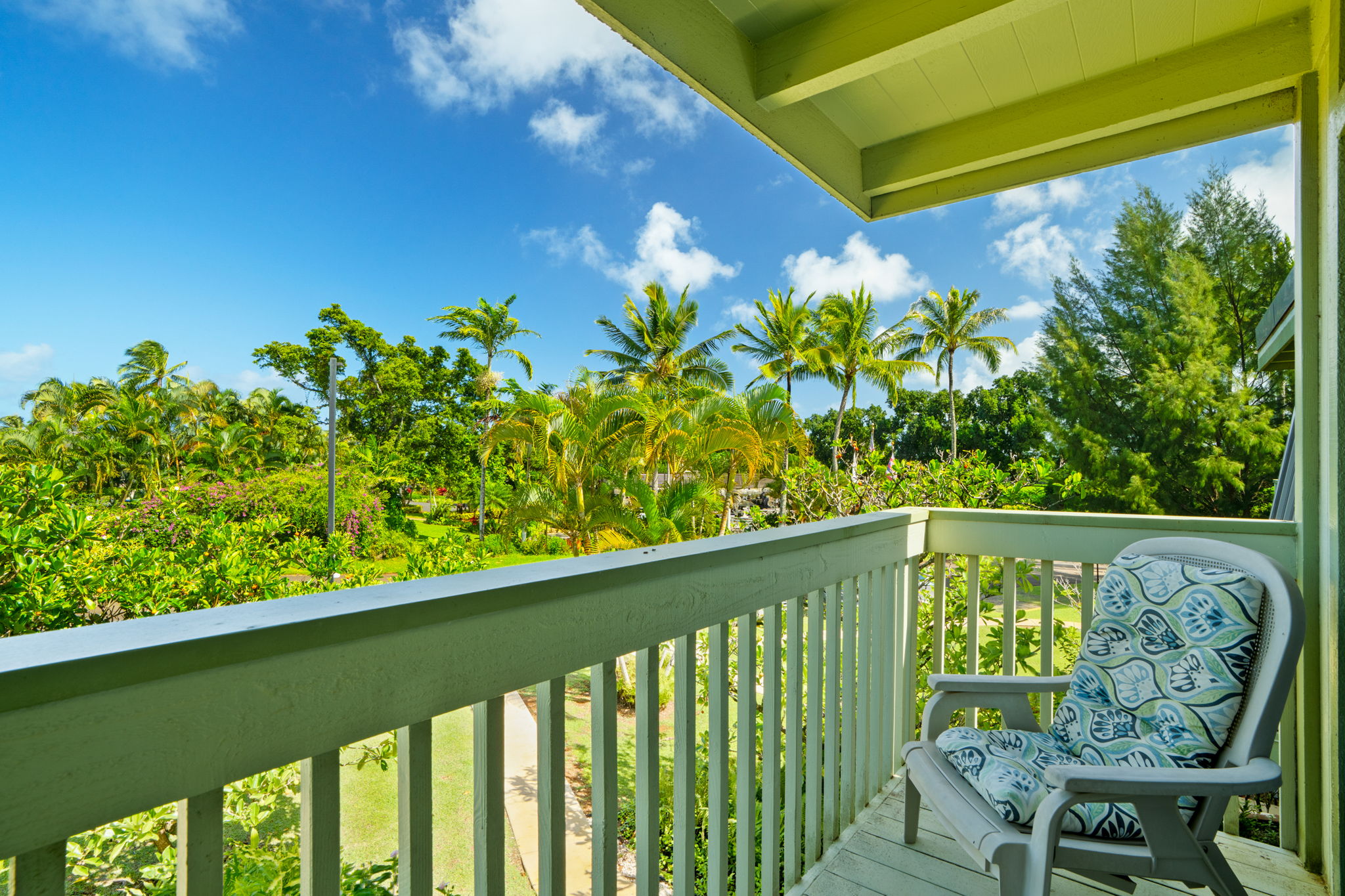 3880 Wyllie Road, Unit 20A Princeville, HI 96722 - Photo 10 of 28 a view of a chair and table in the balcony