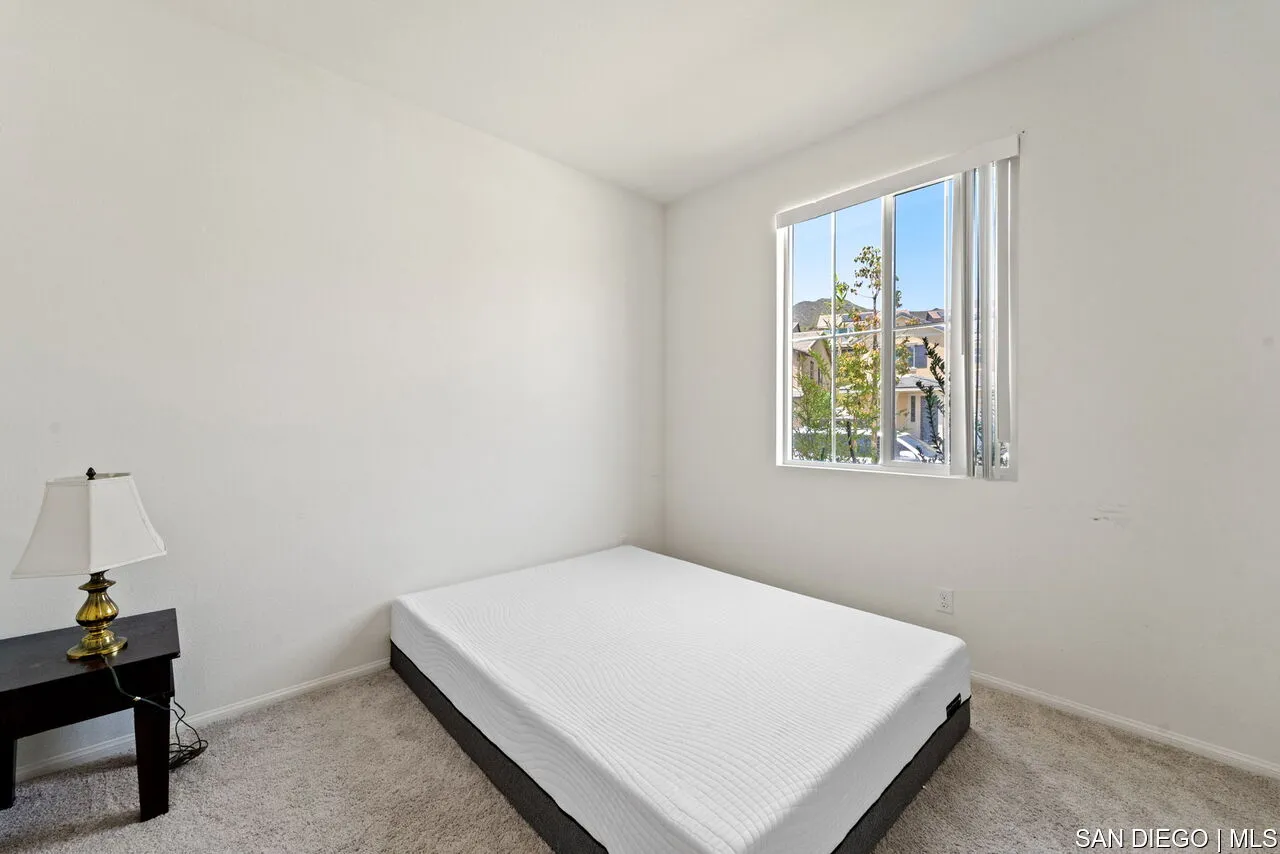 35858 Esperia Way Fallbrook, CA 92028 - Photo 16 of 37 a room with a bed and a window