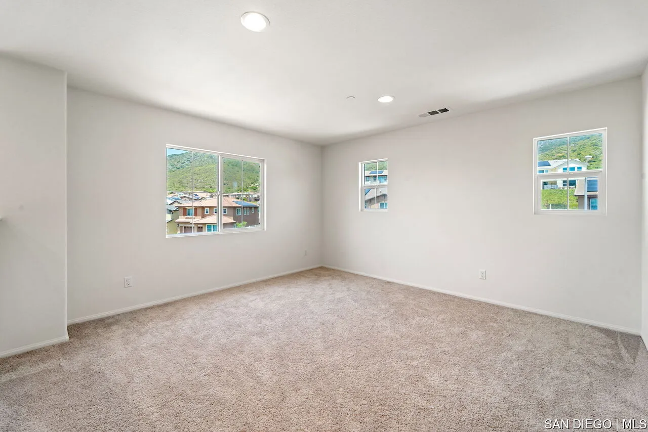 35858 Esperia Way Fallbrook, CA 92028 - Photo 24 of 37 an empty room with windows