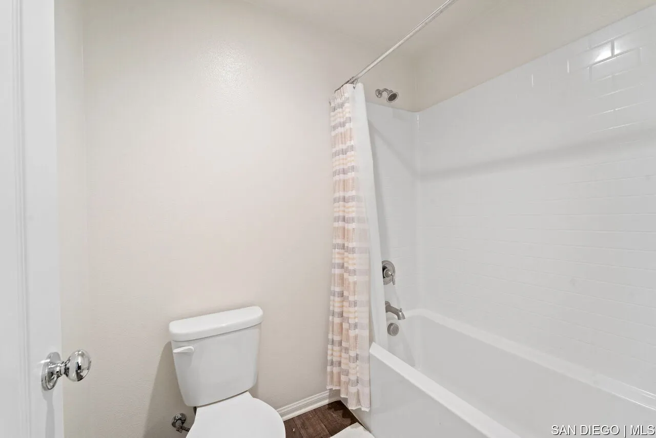 35858 Esperia Way Fallbrook, CA 92028 - Photo 28 of 37 a bathroom with a toilet and a bathtub