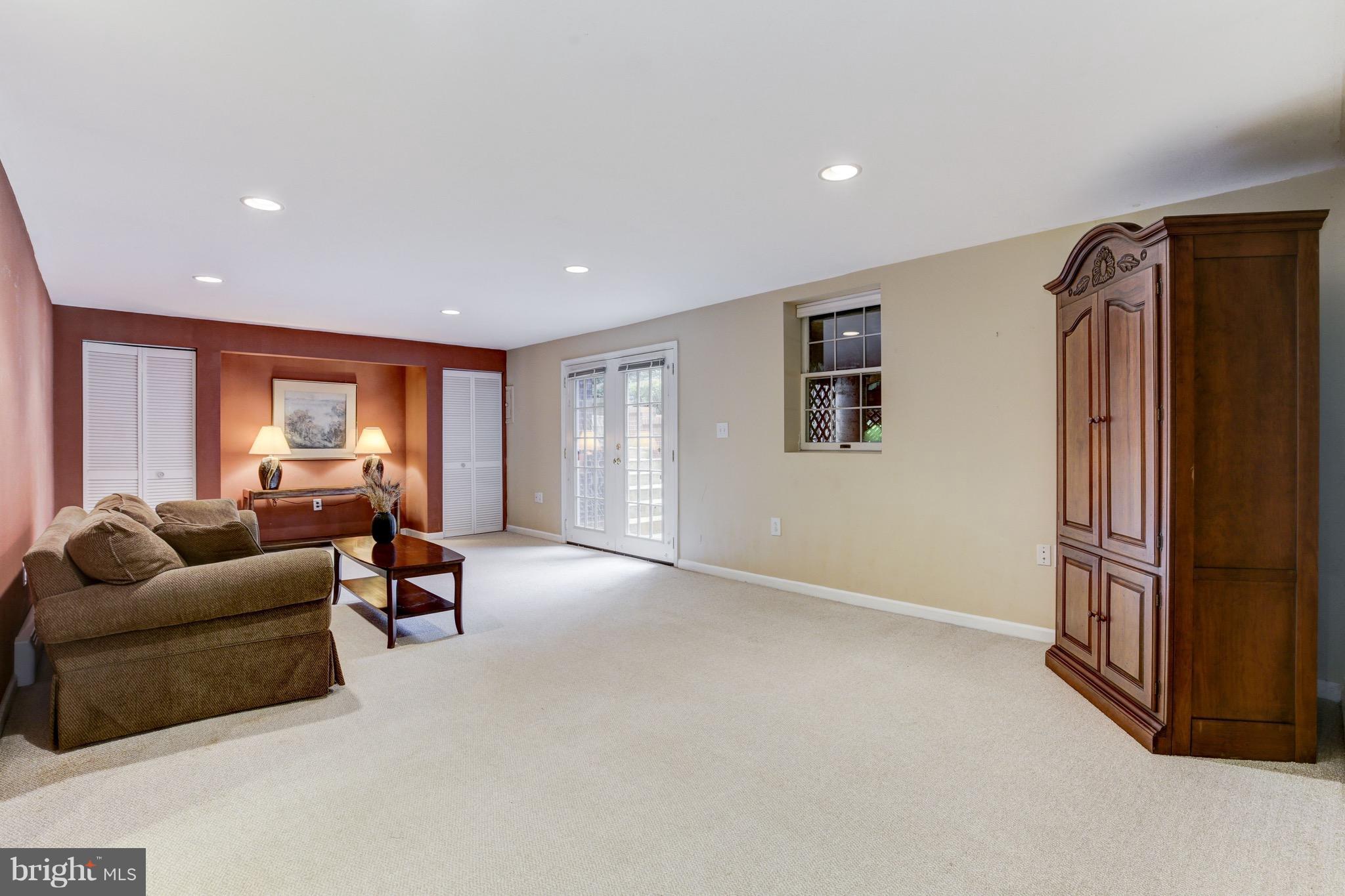 10310 Gary Road Potomac, MD 20854 - Photo 21 of 30 Lower Level Recreation Room With Walkout Patio