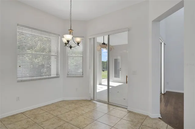 a view of a chandelier in bathroom