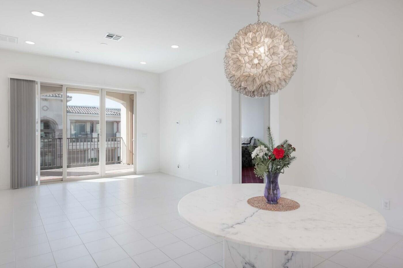 2609 Via Calderia Palm Desert, CA 92260 - Photo 3 of 10 a vase of flowers sitting on a table