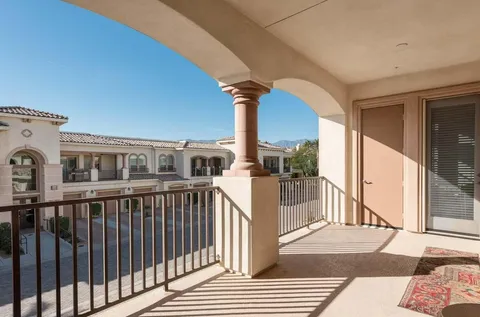 a view of a balcony and front door