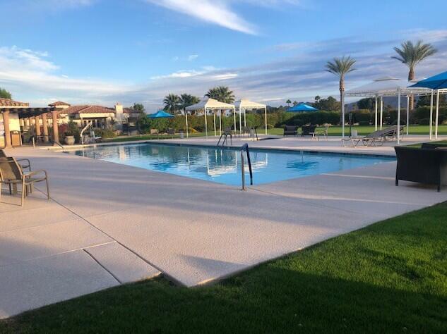 2609 Via Calderia Palm Desert, CA 92260 - Photo 9 of 10 a view of a swimming pool with a yard