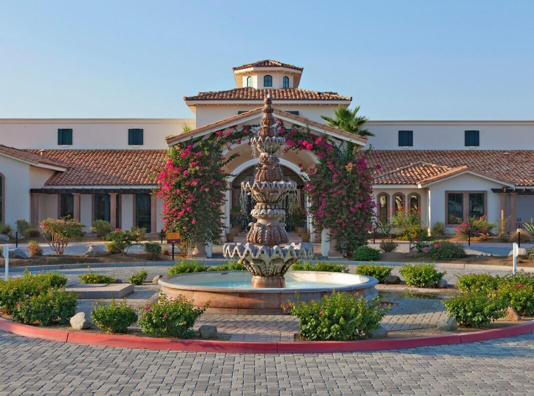 2609 Via Calderia Palm Desert, CA 92260 - Photo 10 of 10 a front view of a house with a yard