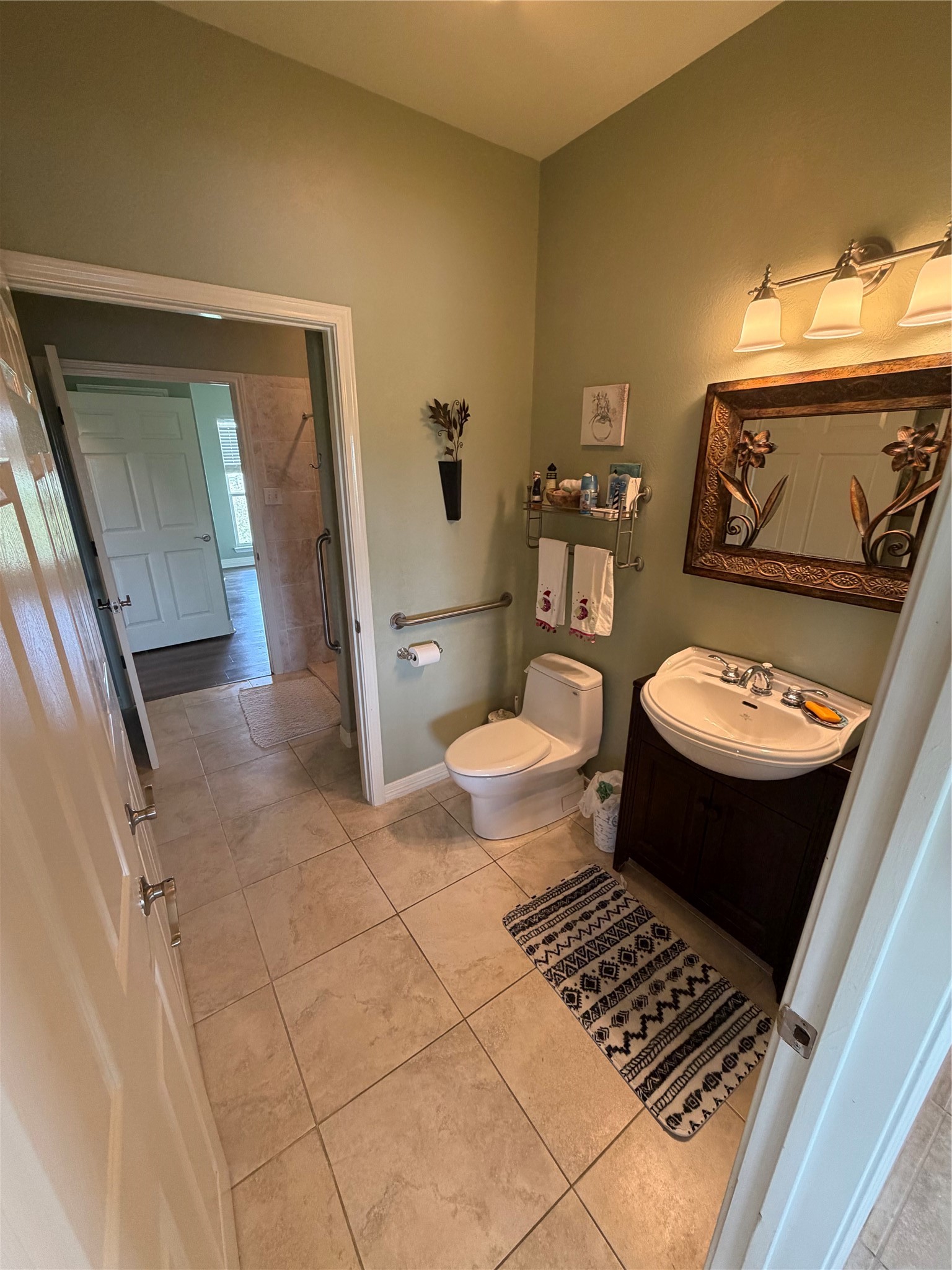 979 Rancho Carribe Drive Crystal Beach, TX 77650 - Photo 38 of 50 Separate toilet and lavatory for easy use from dining area