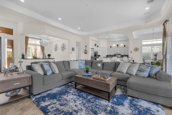 a bedroom with a bed and glass window