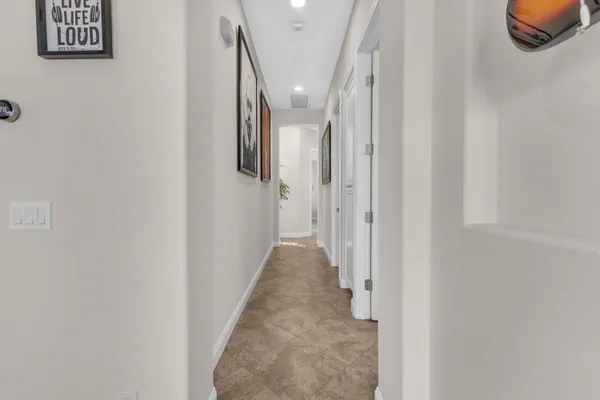 a view of swimming pool with a lounge chair