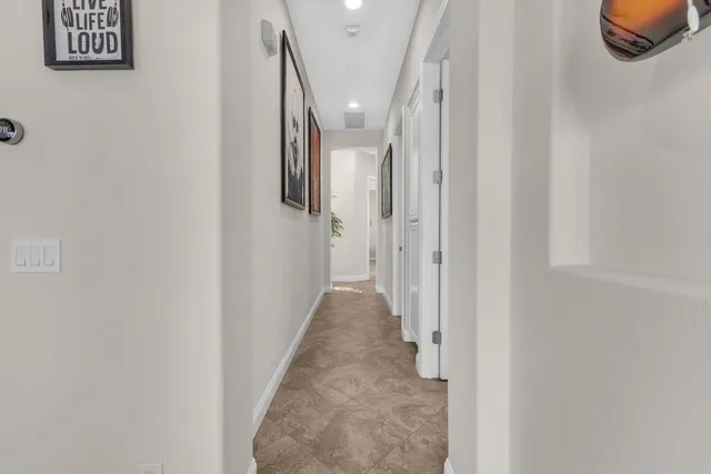 a view of swimming pool with a lounge chair