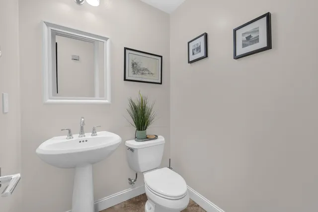 a view of a patio with a table and chairs