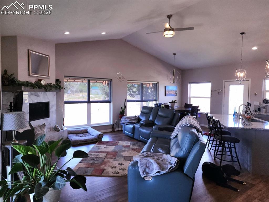 7480 Red Creek Springs Road West Pueblo, CO 81005 - Photo 11 of 47 a living room with furniture kitchen view and a large window