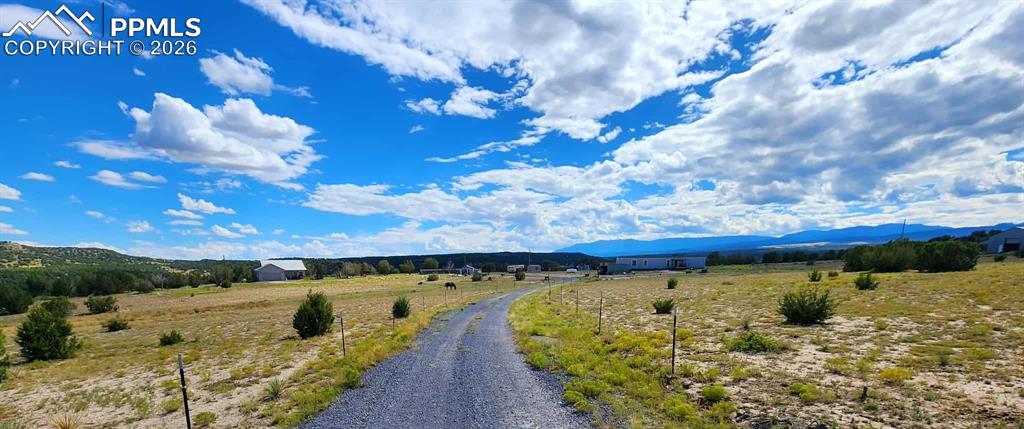7480 Red Creek Springs Road West Pueblo, CO 81005 - Photo 2 of 47 a view of a lake with a yard