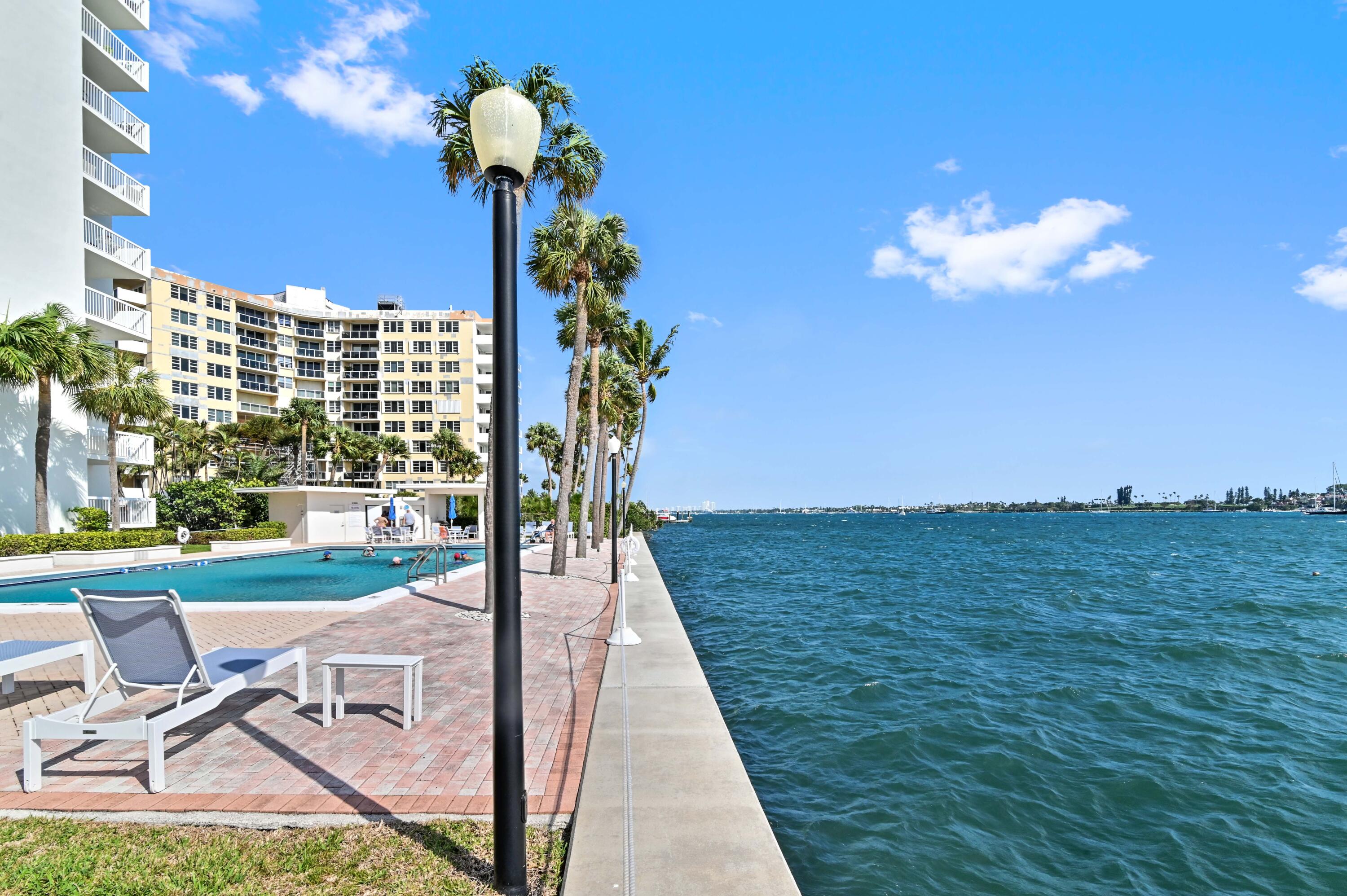 2600 North Flagler Drive, Unit 210 West Palm Beach, FL 33407 - Photo 24 of 25 a front view of a house with a yard