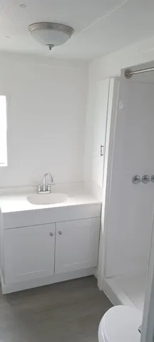 a bathroom with a bathtub and toilet