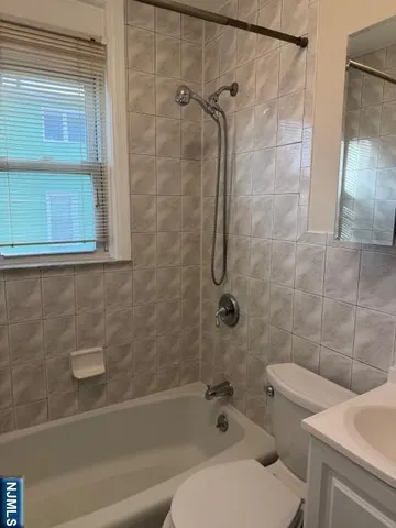 a bathroom with a sink and a bathtub