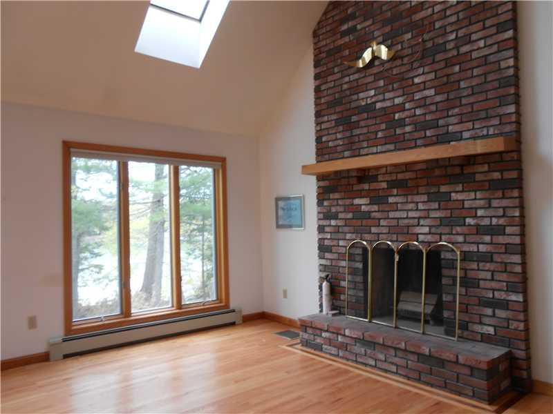48 Hildreth Road Harpswell, ME 04079 - Photo 2 of 12 Living Room. Living Room with wood...