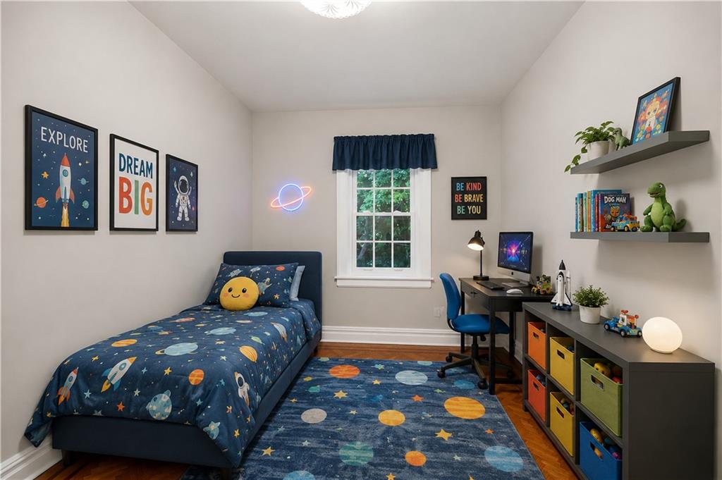 7607 Colonial Road Brooklyn, NY 11209 - Photo 20 of 35 a bedroom with a bed and furniture