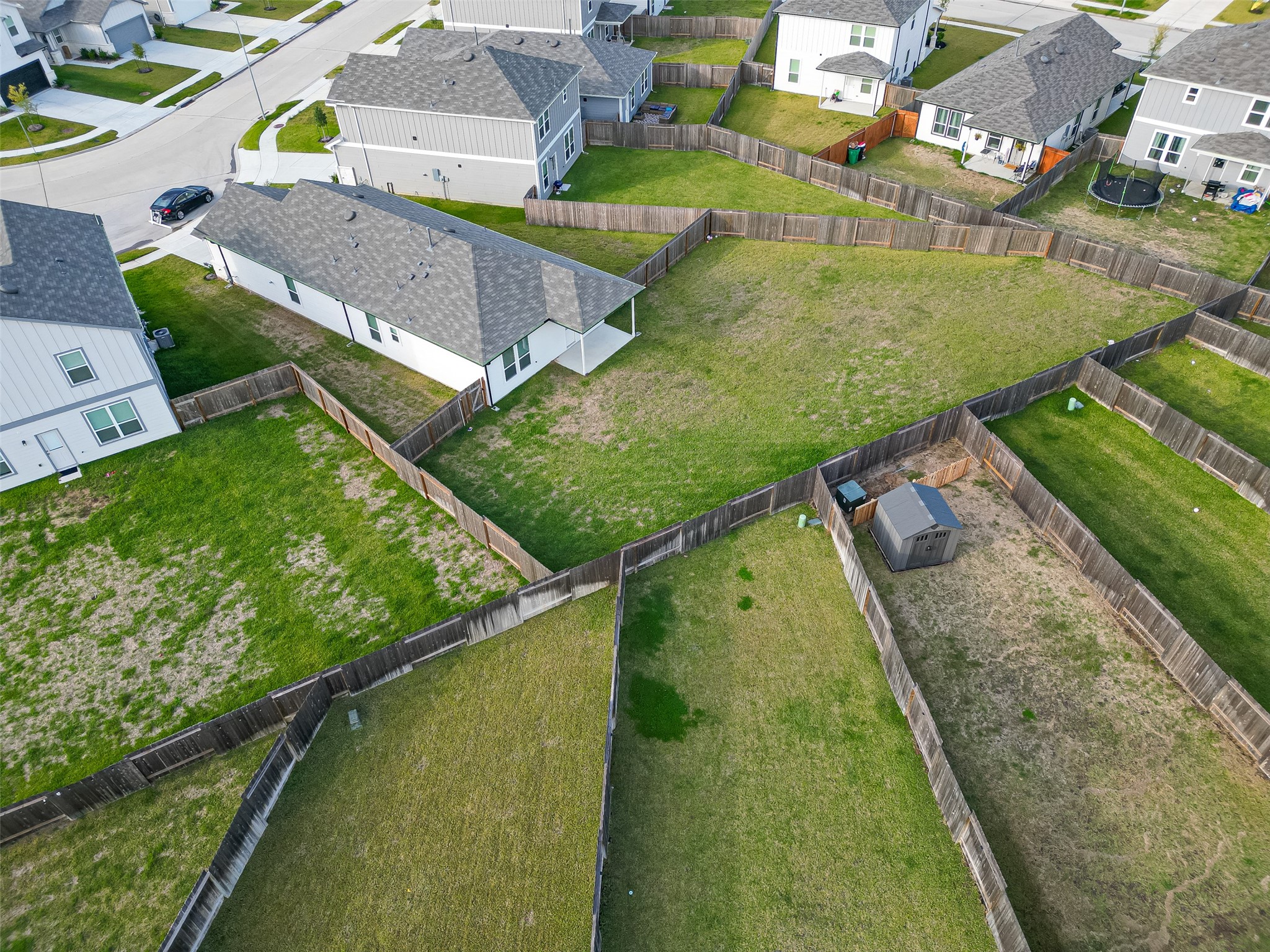 17902 Slurry Rake Lane Hockley, TX 77447 - Photo 31 of 32 an aerial view of a house with a yard