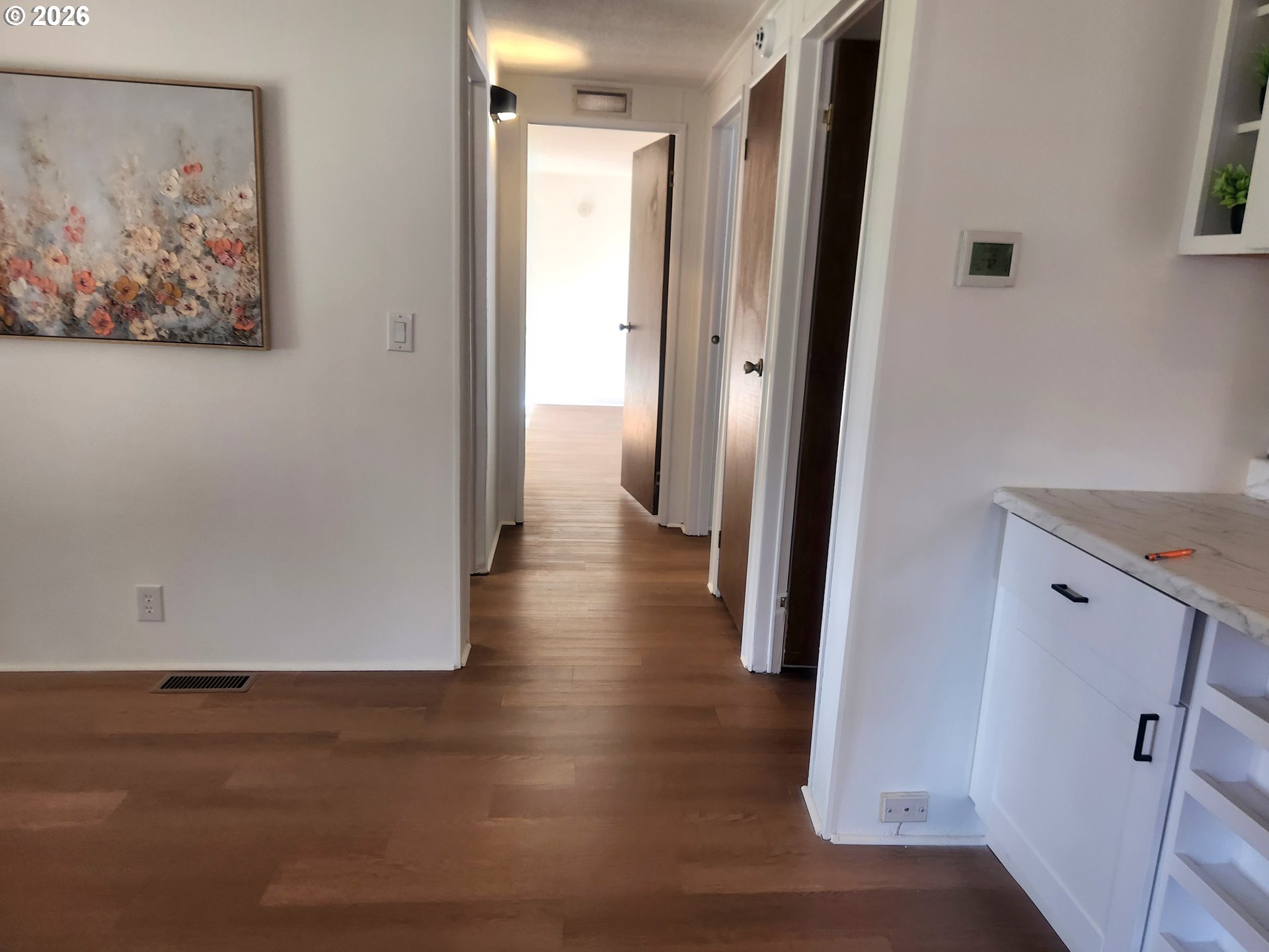 507 North 19th Avenue, Unit 29 Cornelius, OR 97113 - Photo 15 of 26 a view of a hallway with wooden floor