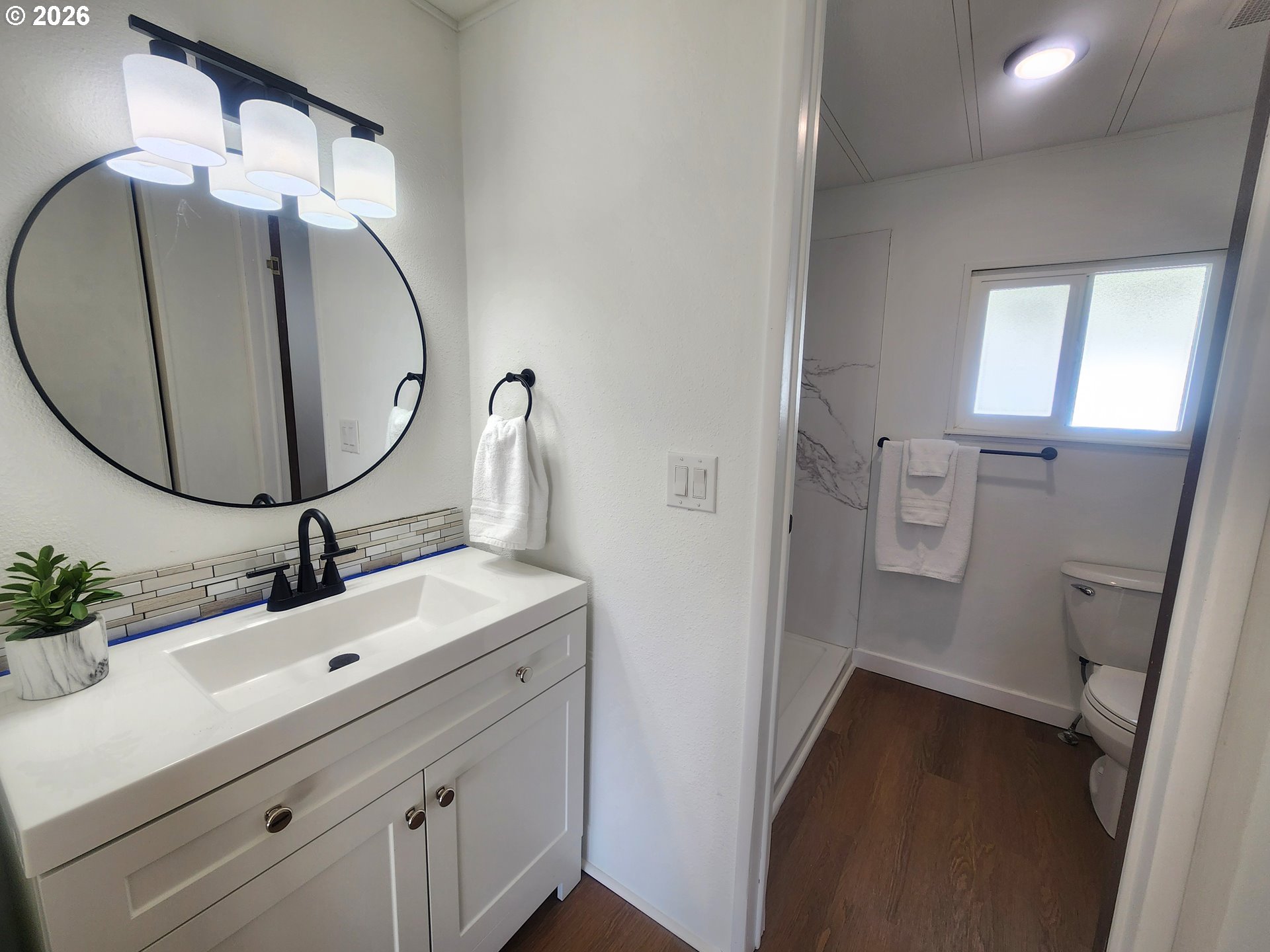 507 North 19th Avenue, Unit 29 Cornelius, OR 97113 - Photo 19 of 26 a bathroom with a sink and a mirror