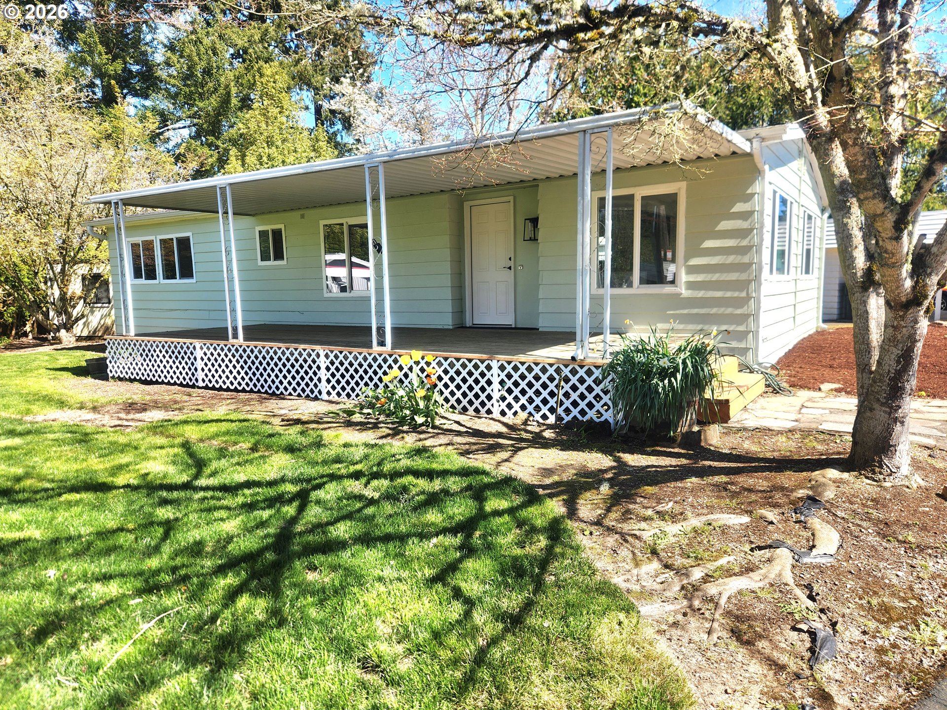 507 North 19th Avenue, Unit 29 Cornelius, OR 97113 - Photo 26 of 26 a front view of a house with a yard