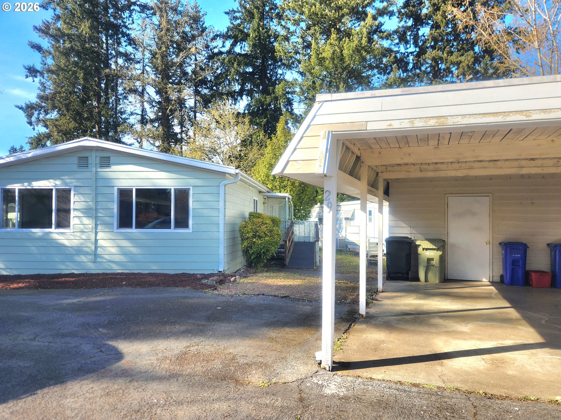 507 North 19th Avenue, Unit 29 Cornelius, OR 97113 - Photo 3 of 26 a front view of a house with a garage