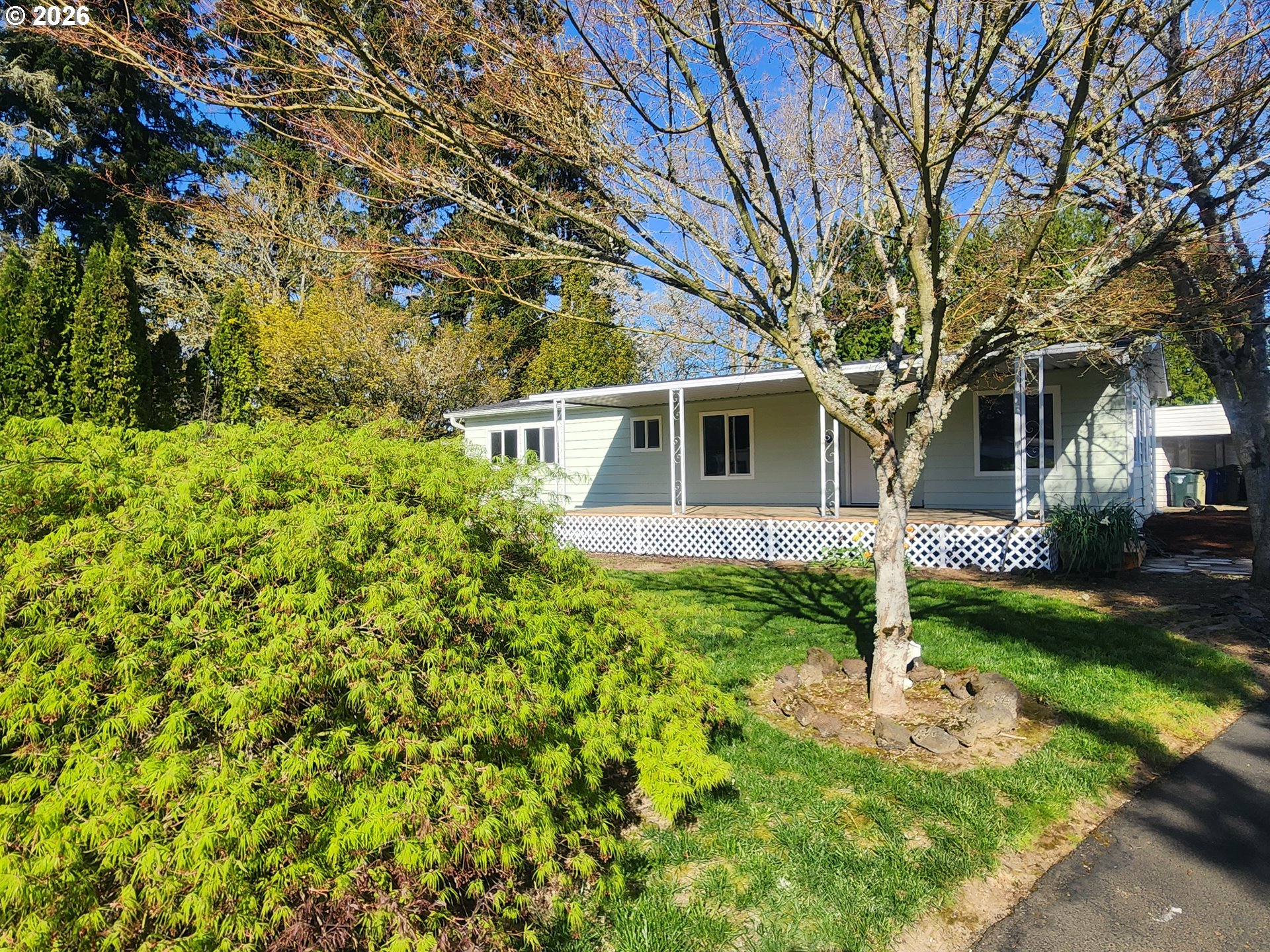 507 North 19th Avenue, Unit 29 Cornelius, OR 97113 - Photo 5 of 26 a front view of a house with garden