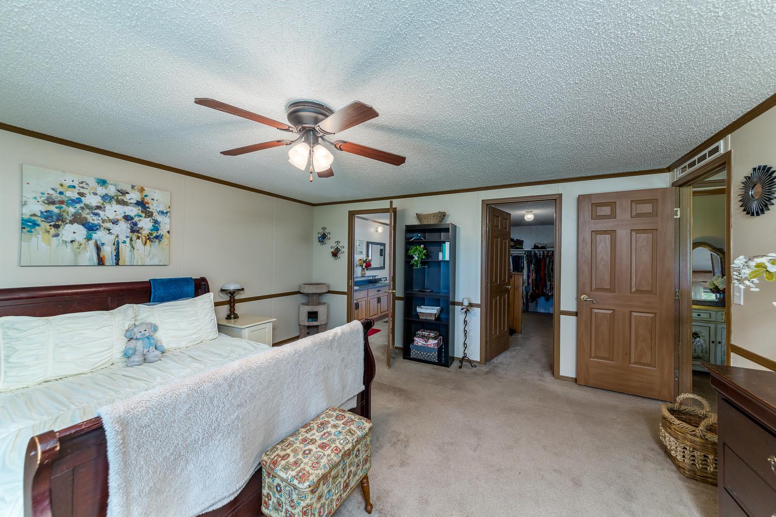 6345 Roy Pearson Road Springfield, TN 37172 - Photo 14 of 30 a living room with furniture and a chandelier