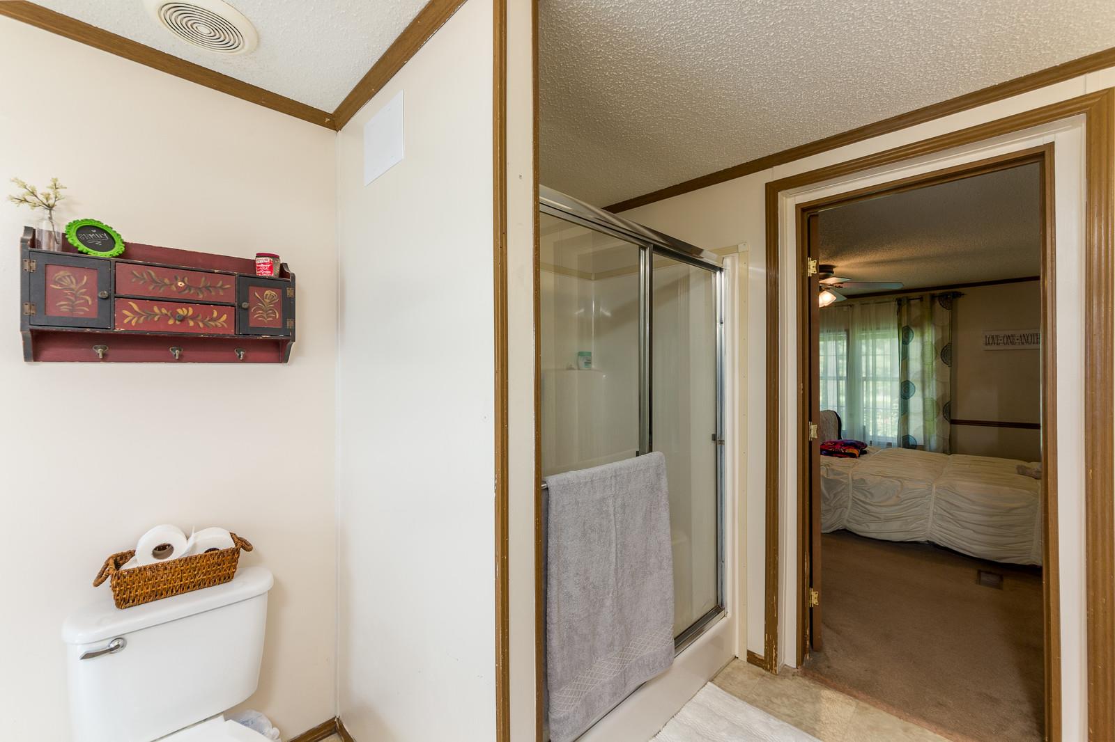 6345 Roy Pearson Road Springfield, TN 37172 - Photo 18 of 30 a en suite bathroom with a shower